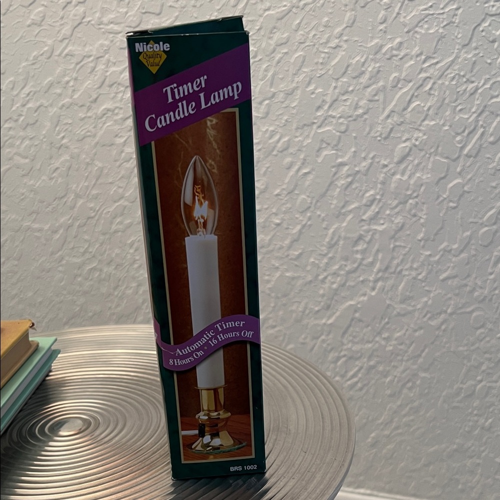 NICOLE TIMER CANDLE LAMP NIB AUTOMATIC TIMER
8 hrs on 16 hrs off.